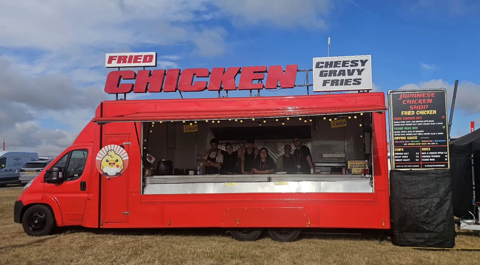 Big Red Food Truck with the team at its open serving hatch