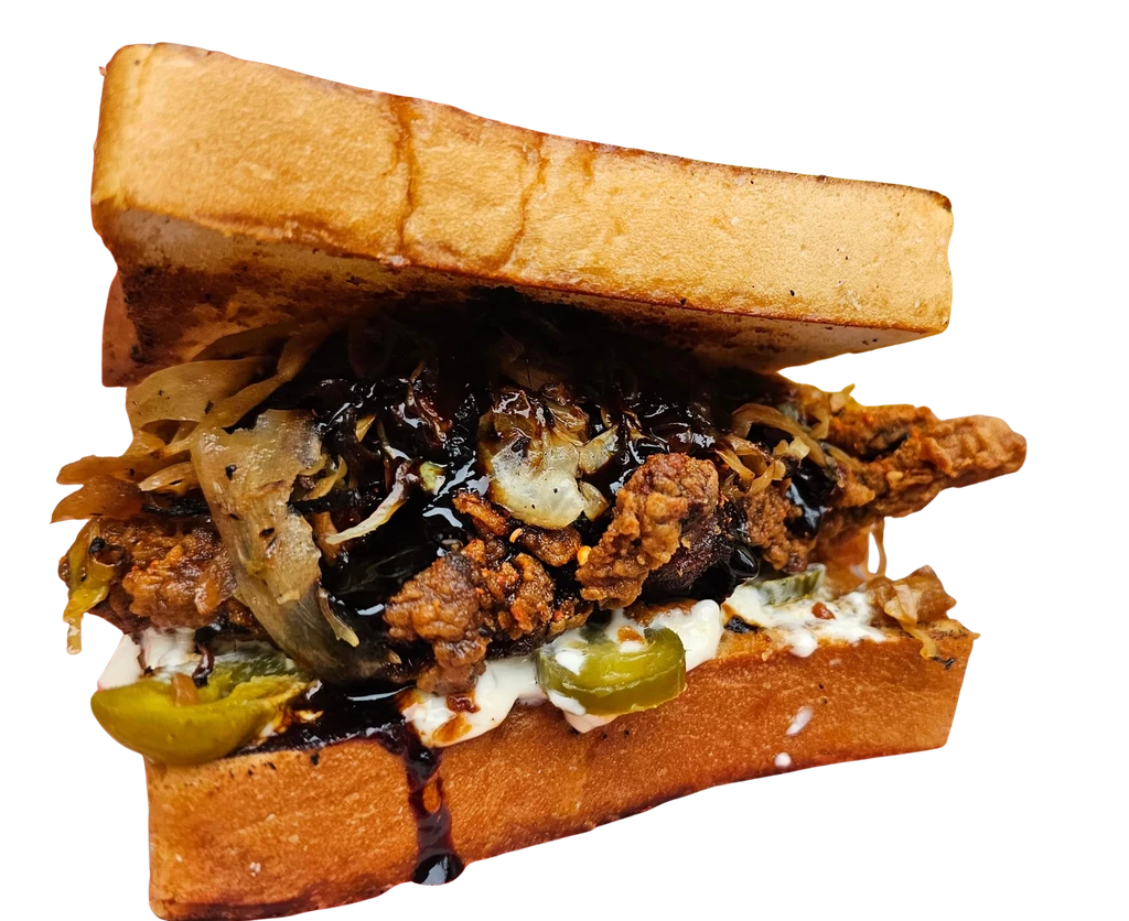 Tokyo Hot fried chicken sando with jalapeños and sauce