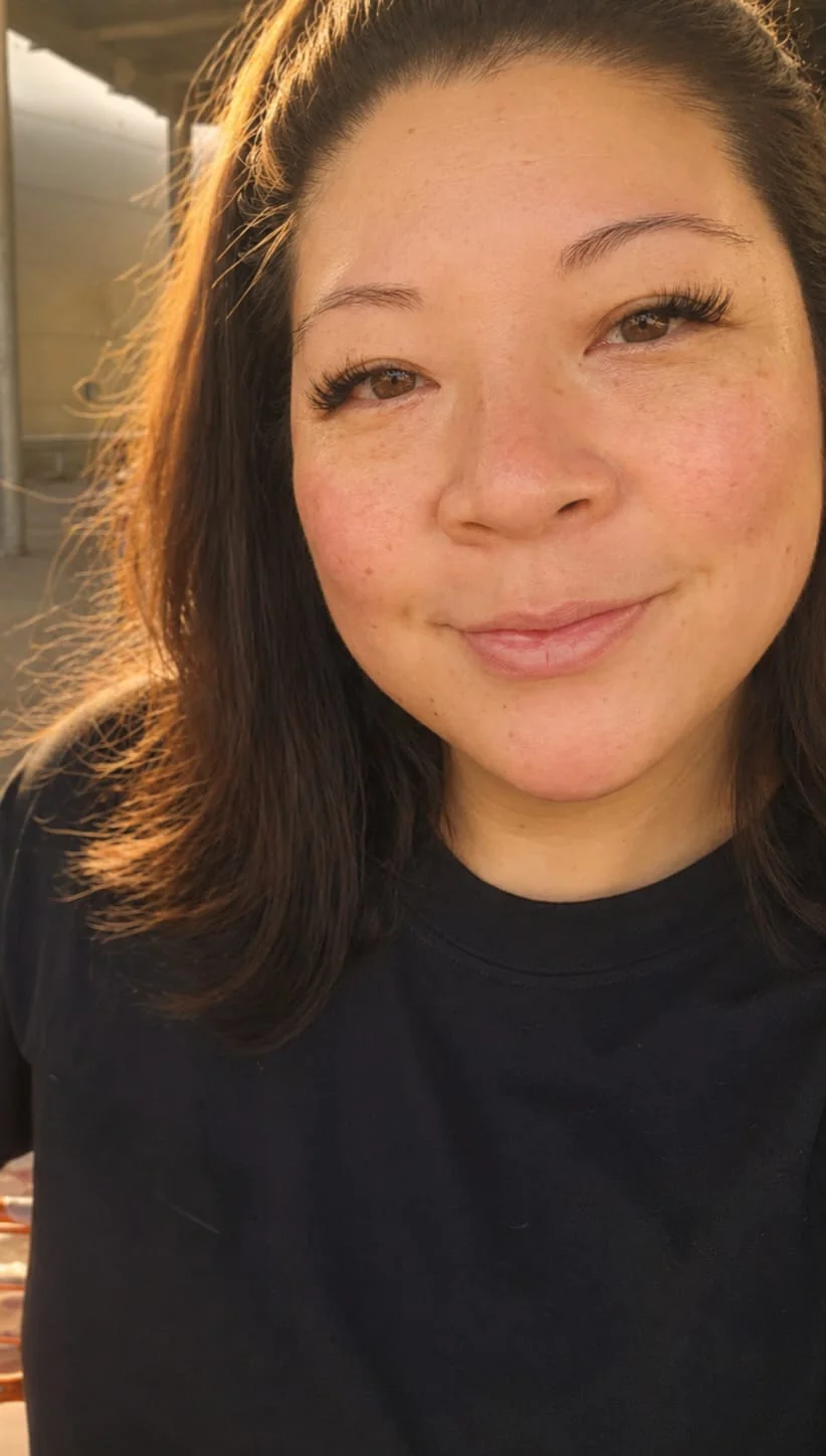 Lani, owner of Monchupon, smiling in the golden sunlight